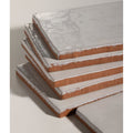 Stacked rectangular shoreline ceramic chalk white tiles with distressed white glaze and exposed terracotta edges