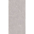 A sleek light gray marble-effect signature Murano pearl gloss tile with subtle veining for elegant interiors