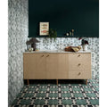 Light wood sideboard with three drawers and two doors featuring minimalist brass handles in smoke green finish