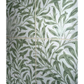 White ceramic tiles featuring an intricate sage green leaf pattern in a stylized botanical design silk screen willow cottage