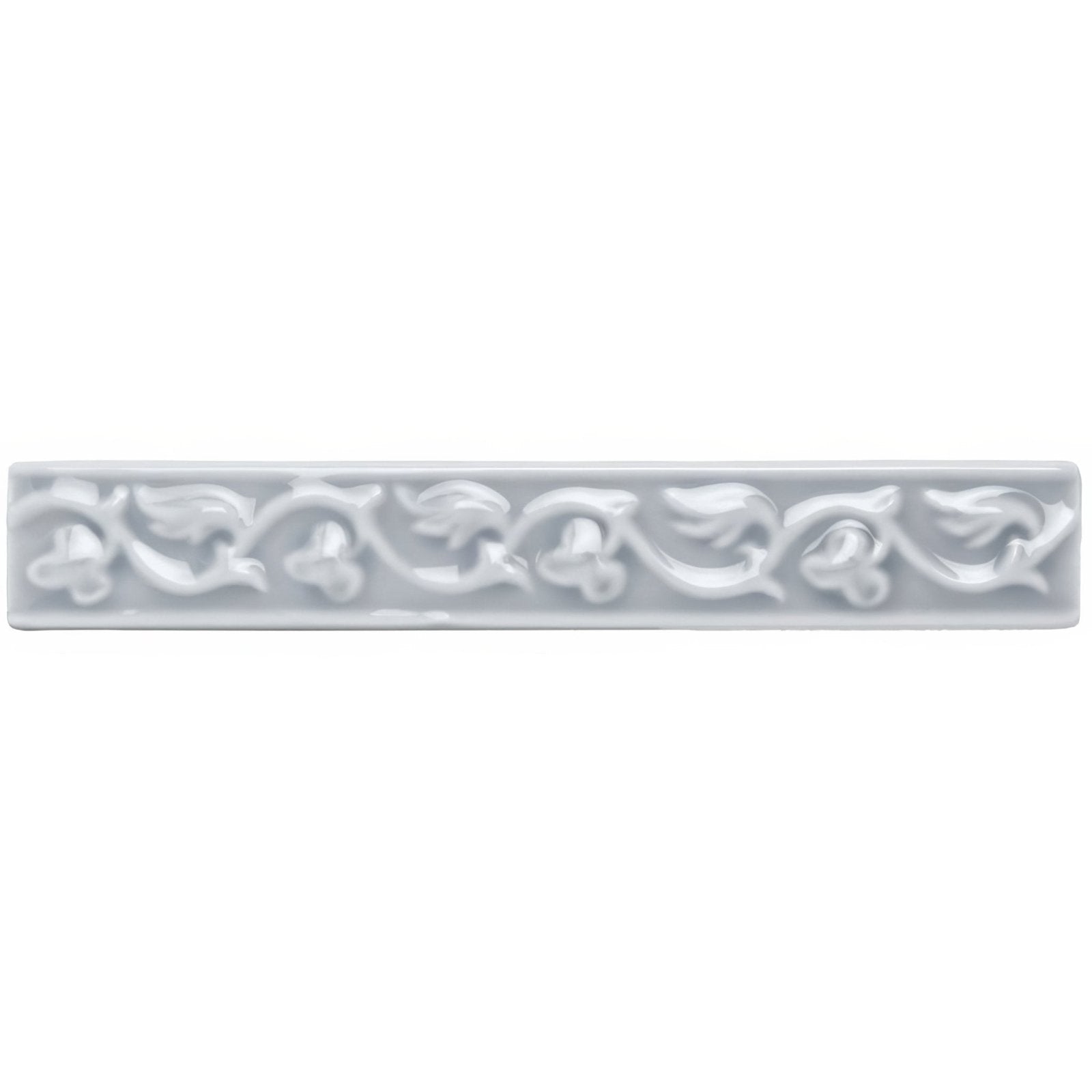 Snape beaulieu rectangular matte white ceramic tile with embossed floral vine pattern along its length