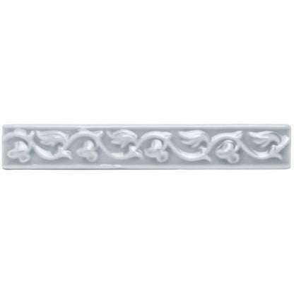 Snape beaulieu rectangular matte white ceramic tile with embossed floral vine pattern along its length
