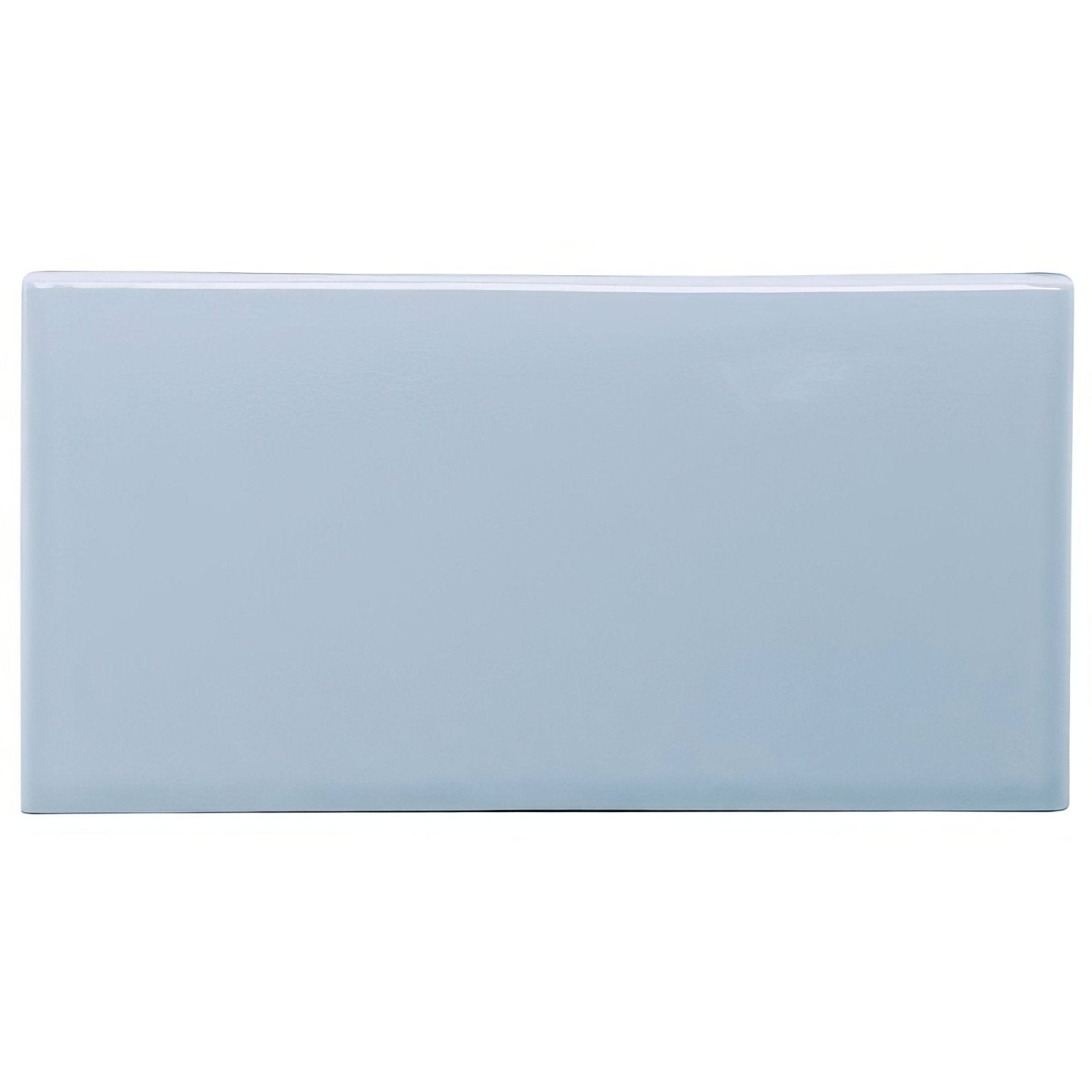 A sleek rectangular light blue ceramic snape half tile with a smooth glossy finish for wall and backsplash use