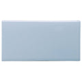 A sleek rectangular light blue ceramic snape half tile with a smooth glossy finish for wall and backsplash use