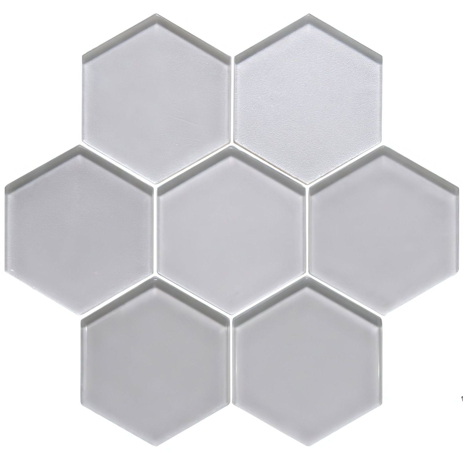 Gray hexagonal glass mosaic tile from solinda metallic hexagon mosaics with a reflective metallic finish