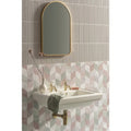 White ceramic wall-mounted south beach ocean sink 60x30cm with gold-toned faucets and matching towel rack