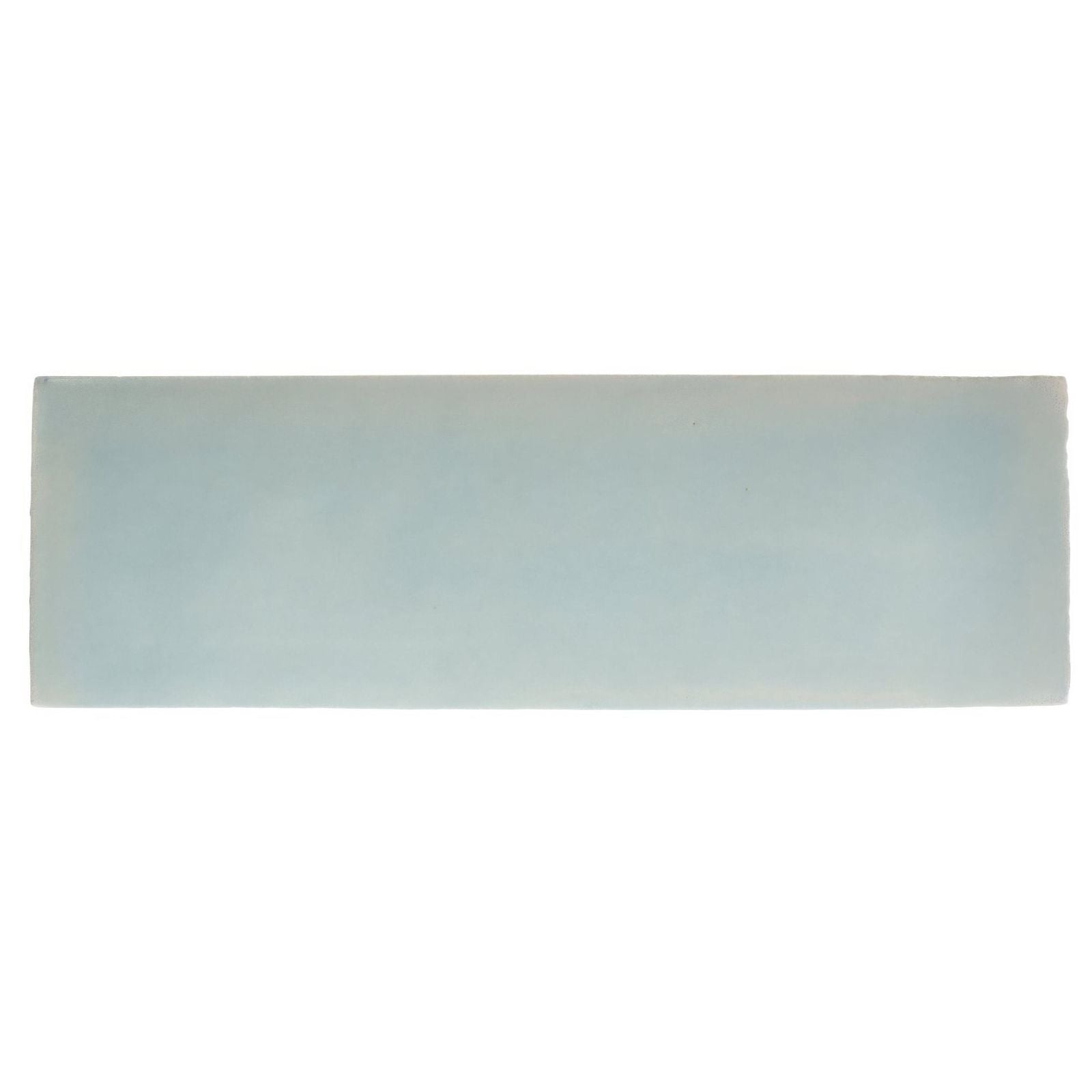 A rectangular matte-finished ceramic South Cliff Celeste brick tile in soft muted light blue hue
