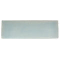 A rectangular matte-finished ceramic South Cliff Celeste brick tile in soft muted light blue hue