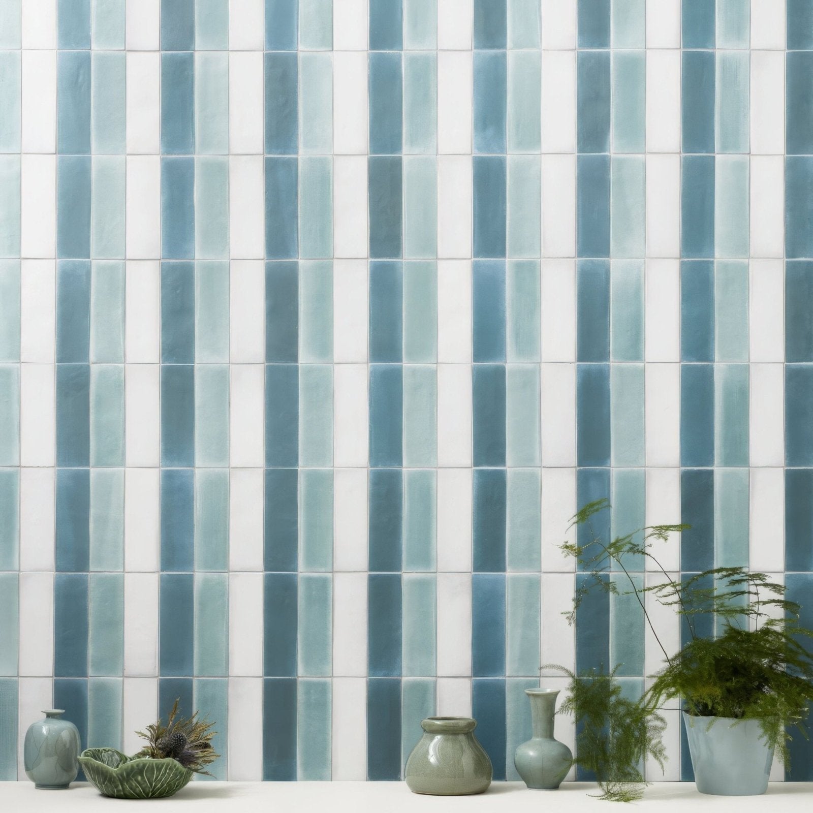 Blue and white vertical stripe ceramic tiles form a glossy wall with south cliff cotton brick tile design