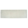 South Cliff Cotton Brick Tile is an off-white rectangular ceramic tile with smooth texture and subtle gray veining