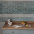 Kitchen countertop with south cliff mist brick tile featuring flour scattered around a wooden rolling pin and white bowl