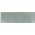 A rectangular matte ceramic tile in soft sage green from the south cliff mist brick tile collection