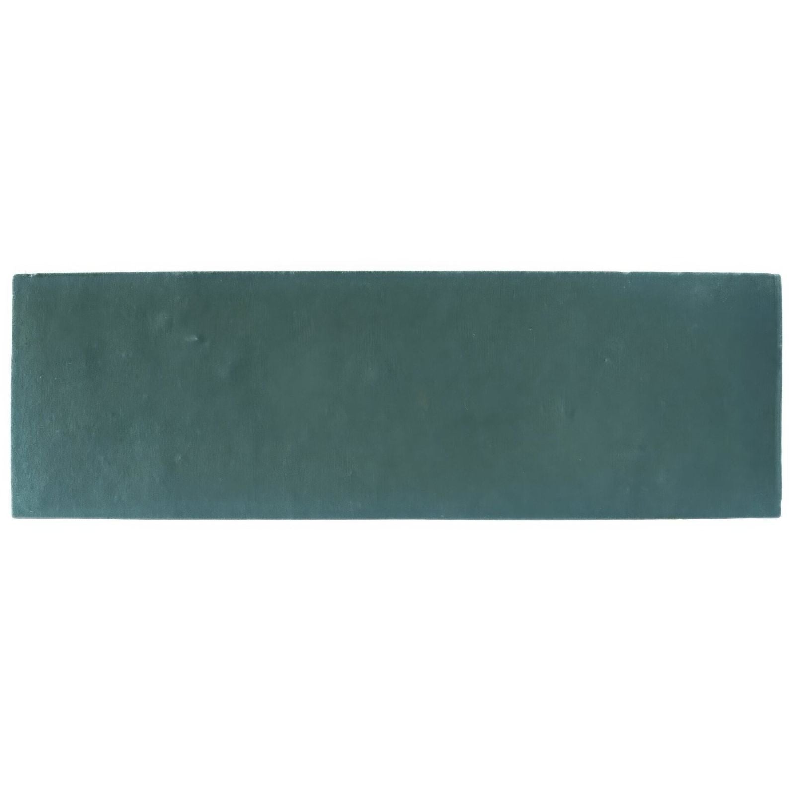 A rectangular matte-finished dark teal ceramic tile with subtle texture from south cliff teal brick tile collection