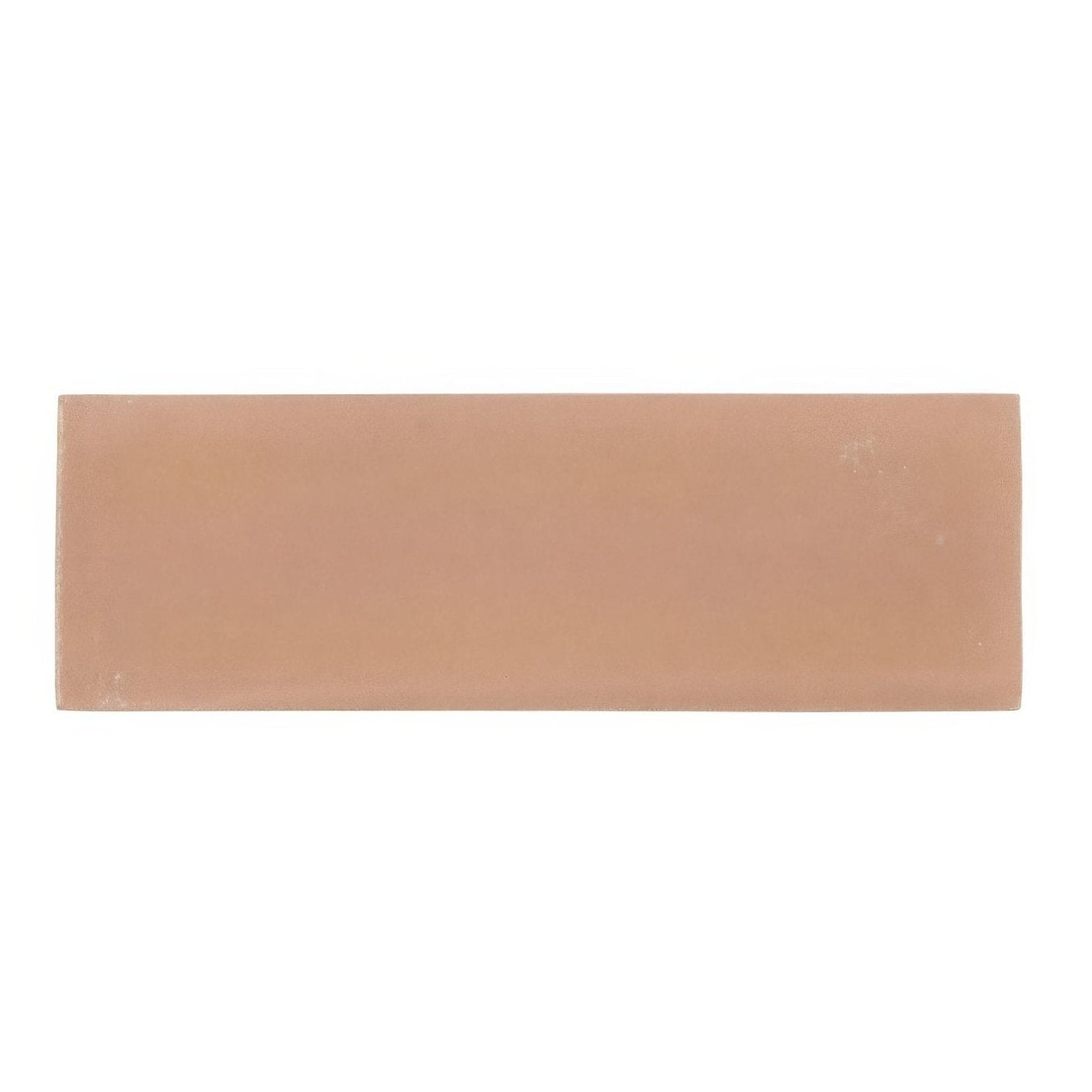 A rectangular matte-finished terracotta-colored ceramic tile with a smooth surface and slightly rounded edges south cliff terra brick tile