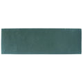 A rectangular matte teal ceramic tile with subtle texture from south cliff brick tile collection