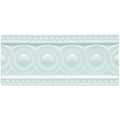 A rectangular light mint-green ceramic tile southwold baroque with raised decorative border and circular motifs