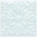 A square light blue ceramic tile with a raised floral pattern from the Southwold Hampstead collection