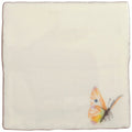 Cream-colored ceramic tile spangled saffron pastel on cotton with delicate hand-painted orange yellow and green butterfly