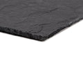 Black slate serving board with natural textured surface and irregular chipped edges spanish black 25 x 40 riven