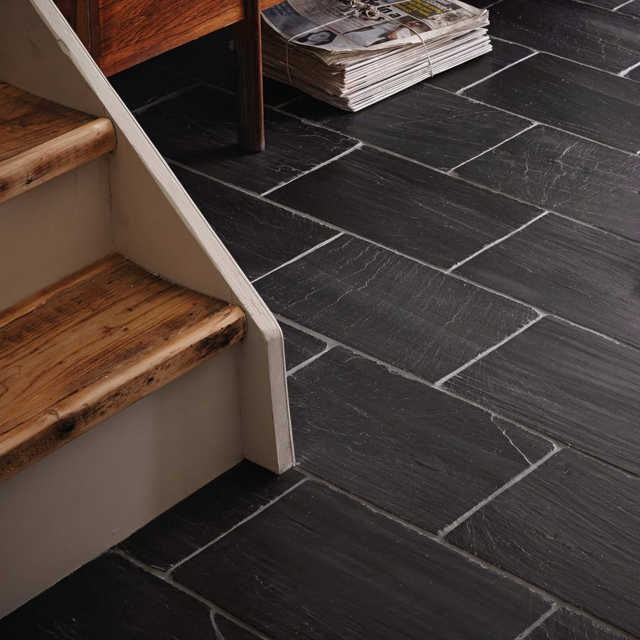 Spanish black 25 x 40 chipped edge riven dark gray slate tiles with natural texture and subtle veining