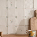 Spring Alice 13 x 13cm cream-colored ceramic tiles with delicate hand-painted floral and starburst pastel motifs