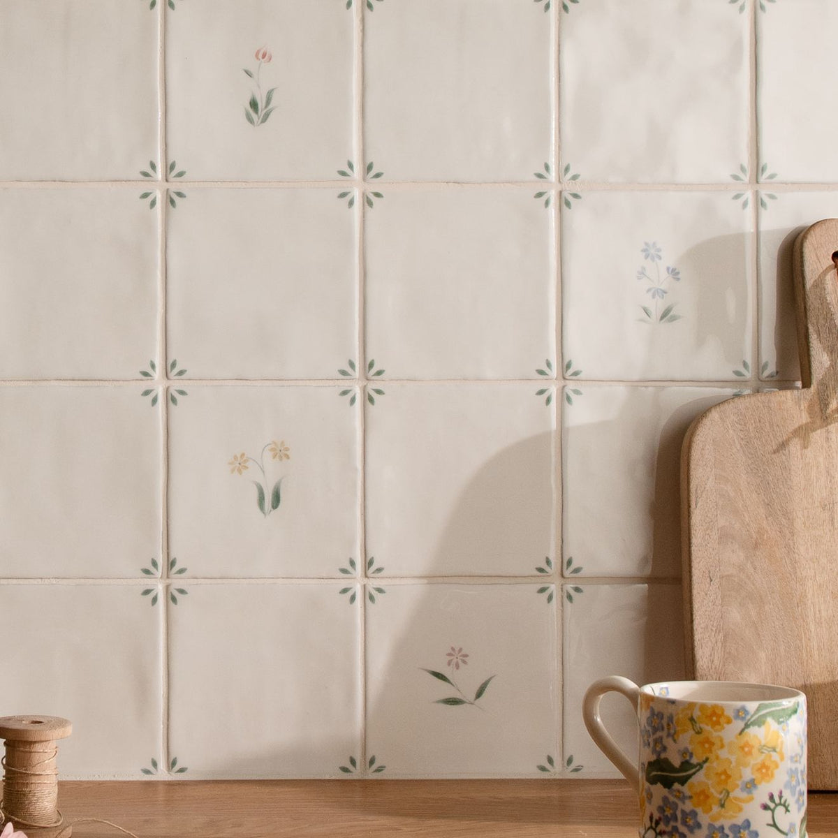 Spring Alice 13 x 13cm cream-colored ceramic tiles with delicate hand-painted floral and starburst pastel motifs