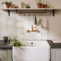 Spring April Blush 13 x 13cm tiles as a wall behind a sink