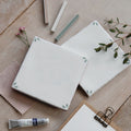 Spring May 13 x 13cm white ceramic tile with sage green leaf motifs