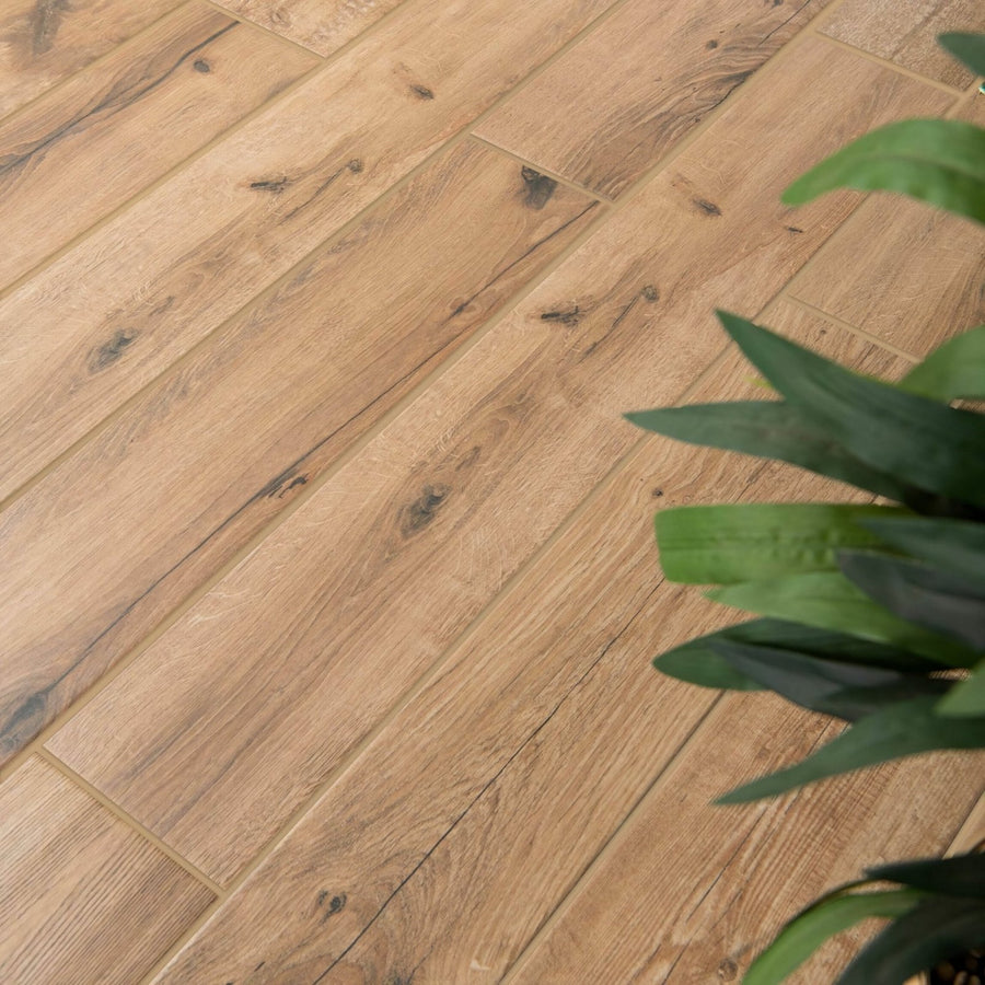 Springwood honey tiles light brown wooden floor planks with natural grain and dark knots for interior flooring