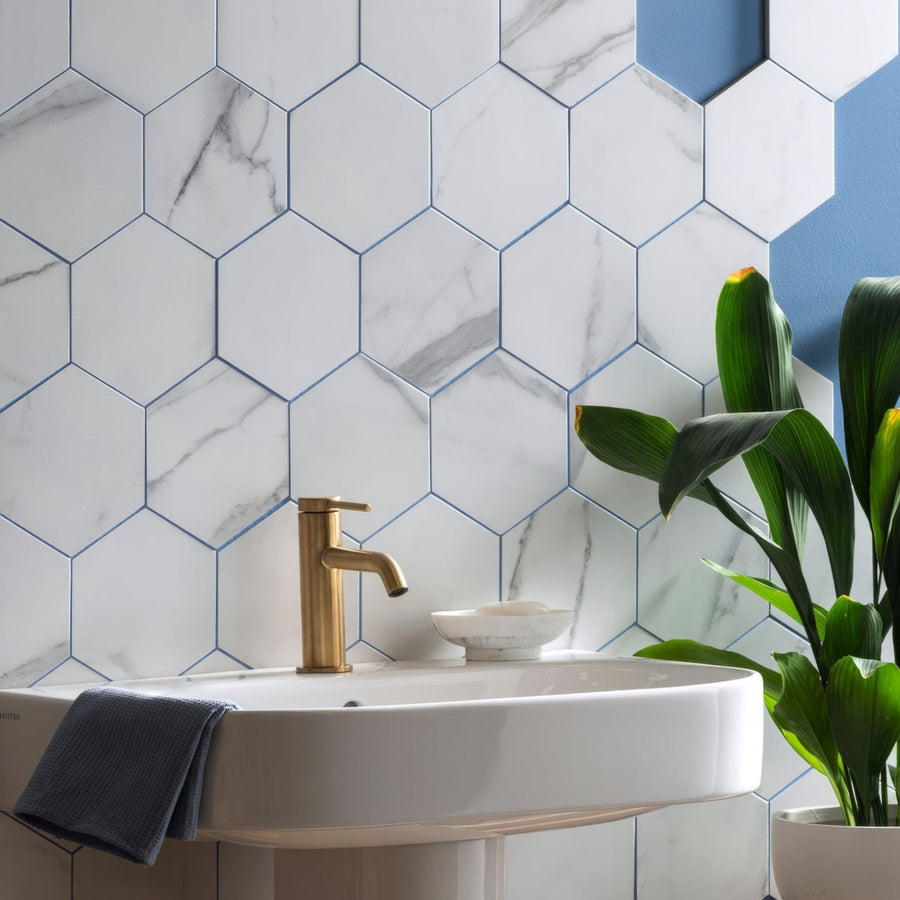 Statuario nuovo honed hexagon mosaic white marble effect bathroom tiles with gray veining and blue grout lines