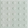 Steel grey multidisc quarry tile in light gray with a textured grid of raised circular bumps for durable flooring