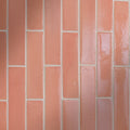 Coral-colored rectangular stone glaze ceramic blossom gloss brick tiles with glossy finish and white grout lines