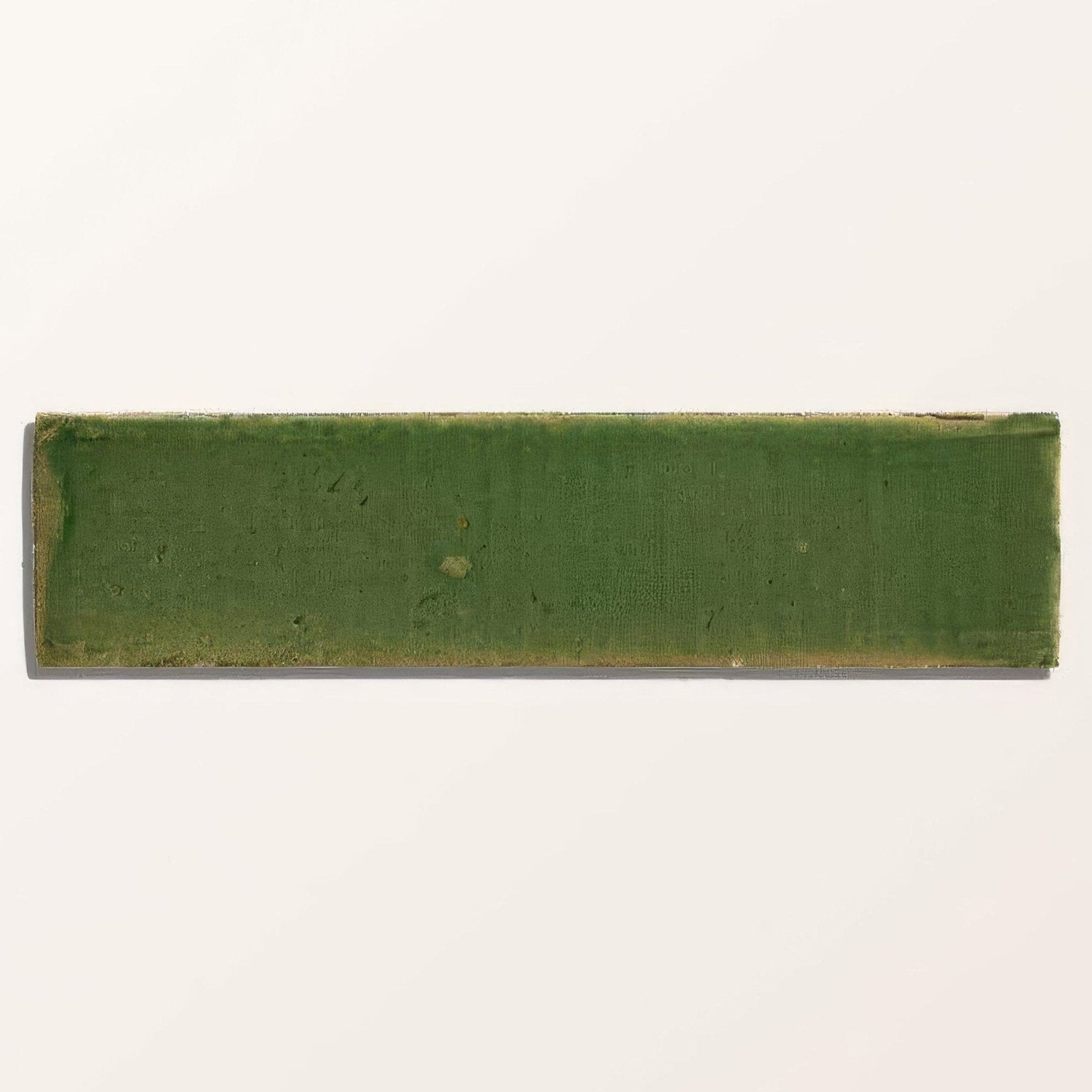 Stone Glaze ceramic british green gloss brick with matte finish, subtle texture, and slight edge wear
