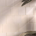 Off-white square ceramic chalkstone matt tiles with subtle texture and clean grout lines for wall and floor use