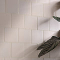 White rectangular stone glaze ceramic chalkstone matt square tiles with subtle texture and clean grout lines