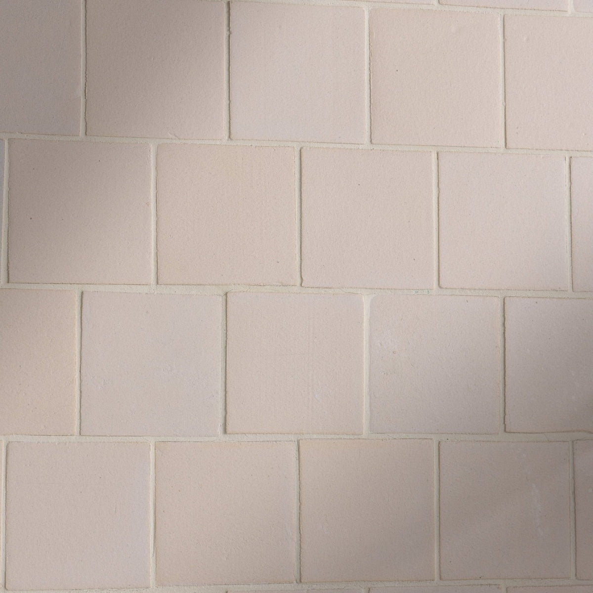 White square stone glaze ceramic chalkstone matt tiles with subtle texture and clean uniform grout lines