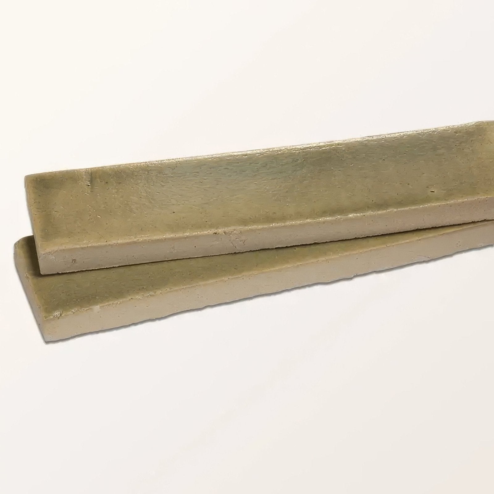 Two beige rectangular matte ceramic tiles with slightly uneven edges from stone glaze ceramic lemongrass gloss brick