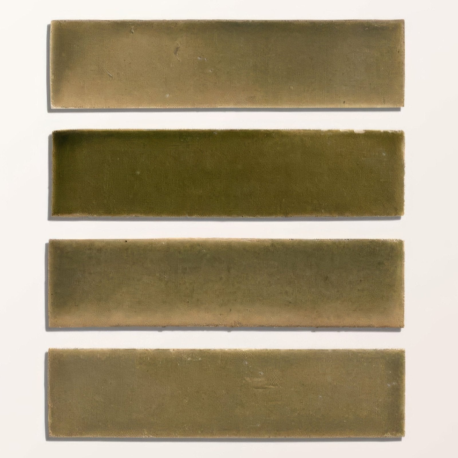 Four rectangular olive green stone glaze ceramic lemongrass gloss brick tiles arranged vertically