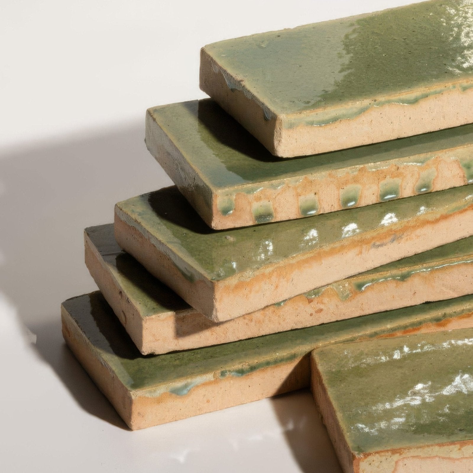Stacked stone glaze ceramic olive leaf gloss brick tiles with glossy sage green glaze and unglazed beige clay edges