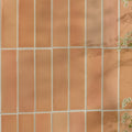 Stone glaze ceramic petal gloss brick featuring terracotta tiles with warm earthy orange hue and subtle tone variations