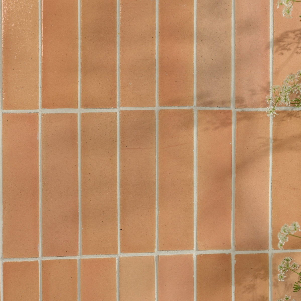 Stone glaze ceramic petal gloss brick featuring terracotta tiles with warm earthy orange hue and subtle tone variations