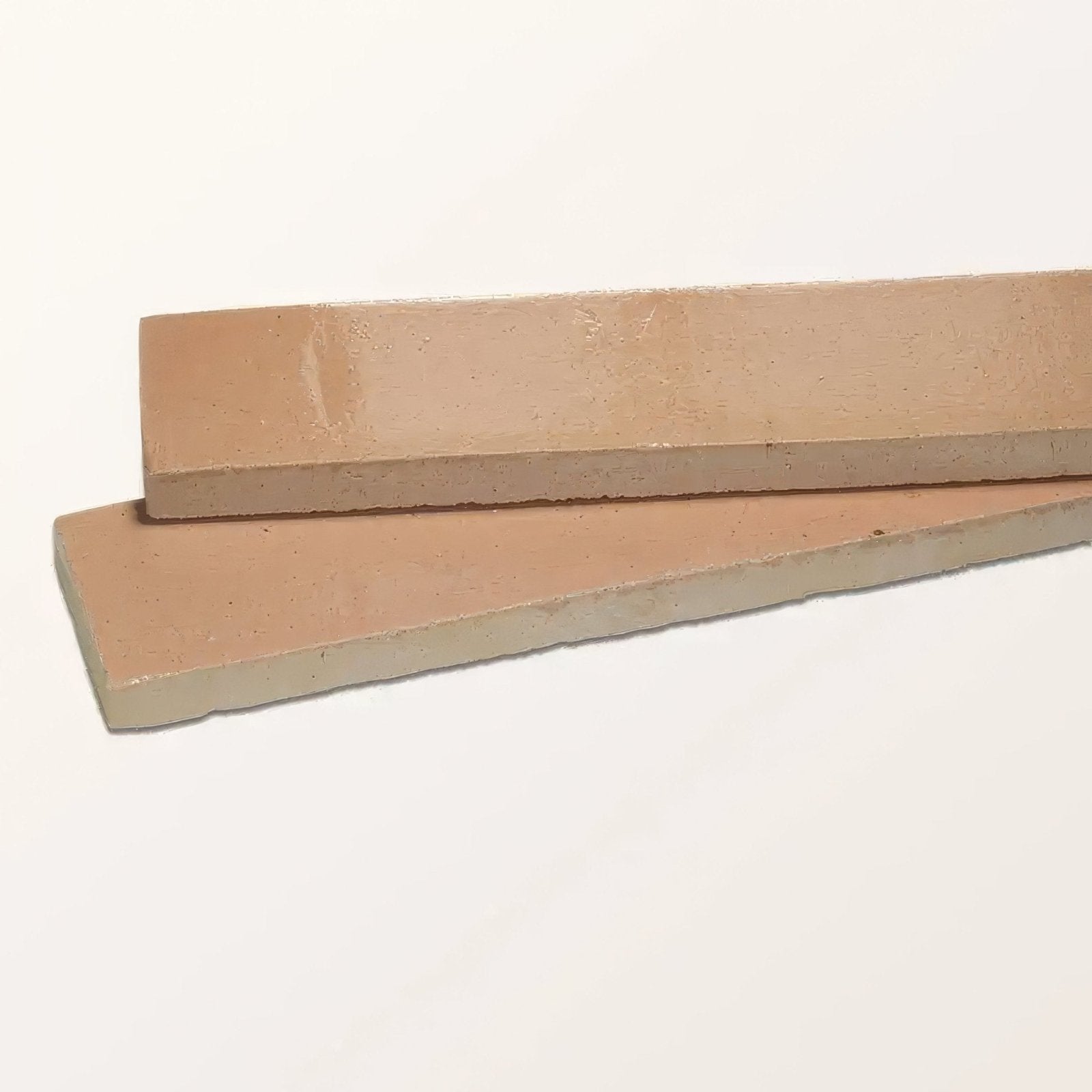Two beige stone glaze ceramic petal gloss brick tiles with matte finish and slightly uneven edges