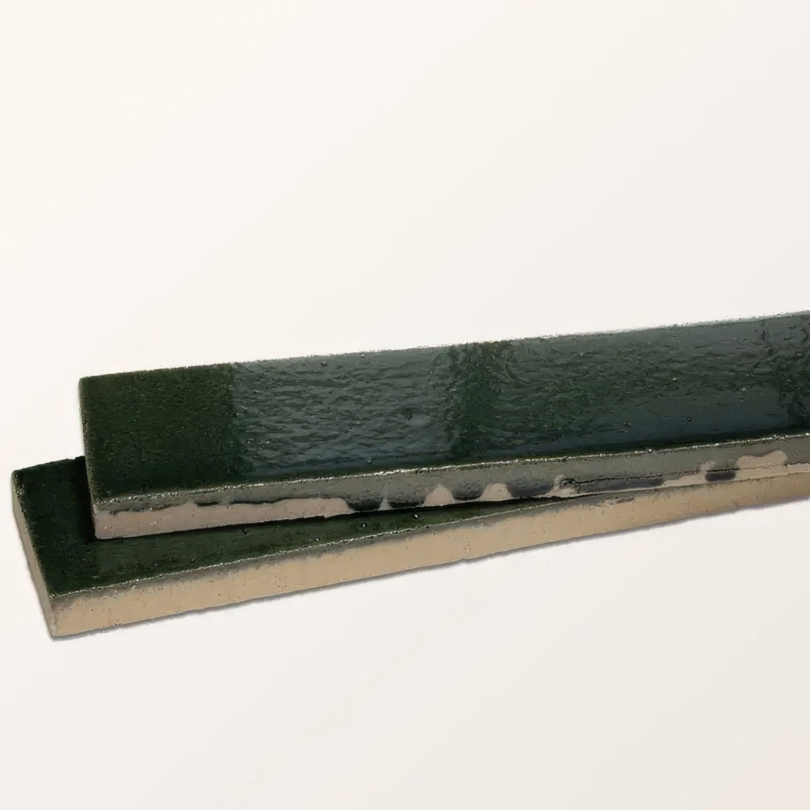 Dark green stone glaze ceramic petrol green gloss brick tiles with textured glossy finish and visible edges