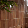Stone glaze ceramic tan gloss brick featuring rich terracotta rectangular tiles with a glossy finish and thin grout lines