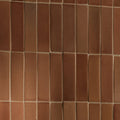 Reddish-brown stone glaze ceramic tan gloss bricks arranged in a rectangular grid with visible mortar lines