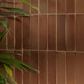 Stone glaze ceramic tan gloss brick terracotta-colored rectangular tiles with matte finish arranged in vertical rows