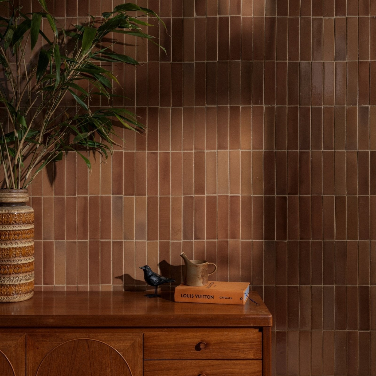 Warm brown rectangular stone glaze ceramic tan gloss brick tiles with subtle glossy finish and uniform vertical alignment