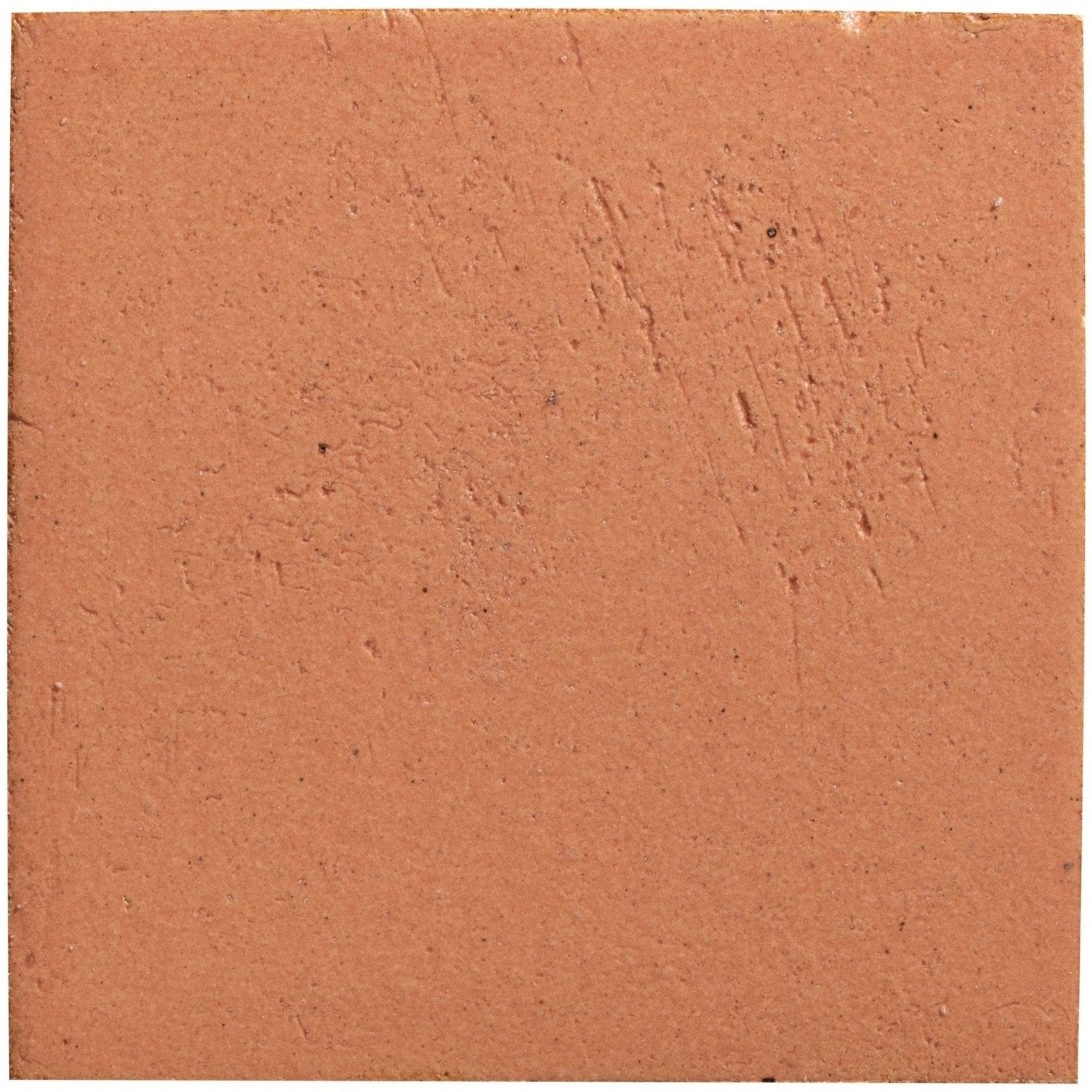 Stone glaze ceramic terra matt square tile in terracotta color with a textured slightly rough surface