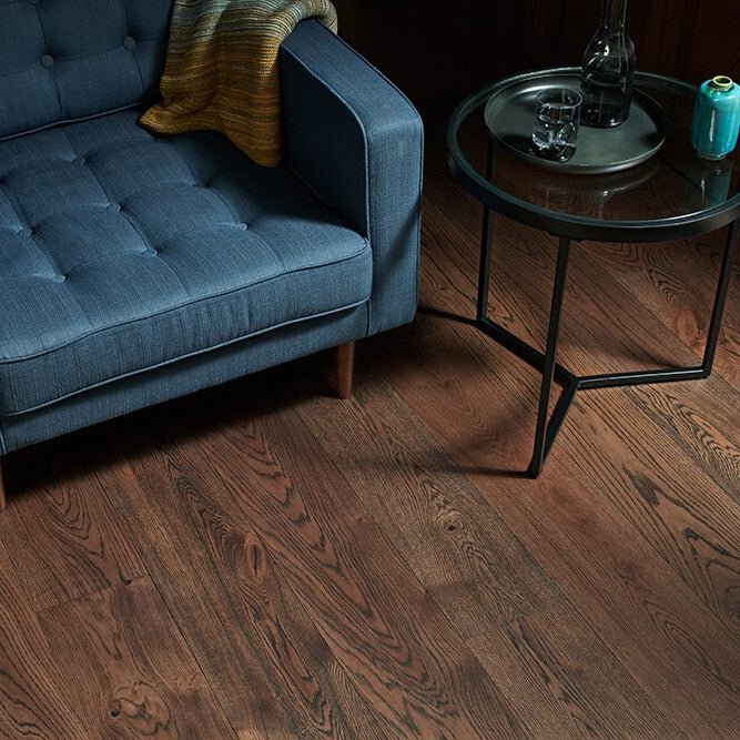 Dark brown stonehaven brook oak wood-plank flooring with rich natural grain pattern and durable oak material