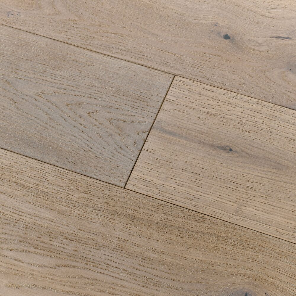 Light-colored oak hardwood flooring with natural wood grain and subtle knots stonehaven strait oak material